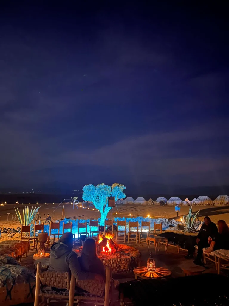 Stargazing at a Marrakech desert camp with clear Milky Way views and campfire.